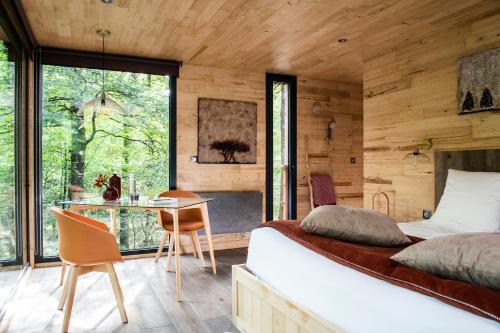Un ou plusieurs lits dans un hébergement de l'établissement Loire Valley Lodges - Hotel