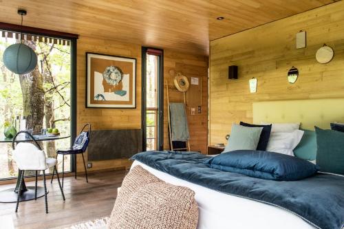 Un ou plusieurs lits dans un hébergement de l'établissement Loire Valley Lodges - Hotel
