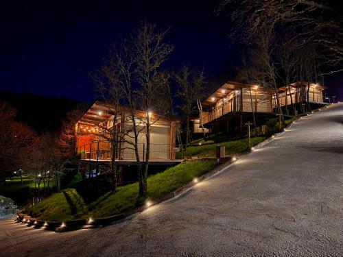 a building with lights in front of it at night at Casal Oseira in Ourense