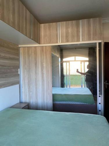 Krevet ili kreveti u jedinici u okviru objekta Apartamento cobertura 2 quartos, 2 banheiros.