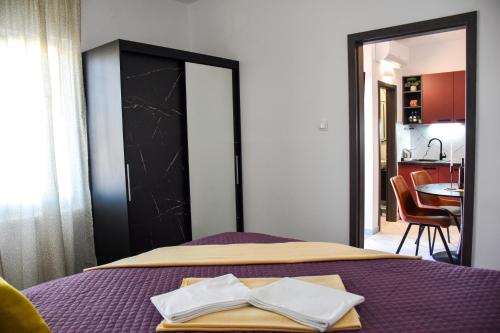 Katil atau katil-katil dalam bilik di Apartmani Čeko