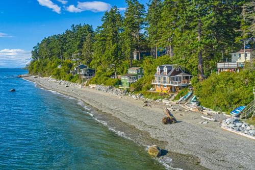an aerial view of a beach with houses at Half Shell, Unit 2 in Point Roberts