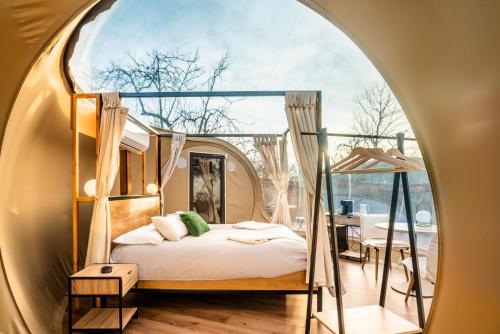 Postel nebo postele na pokoji v ubytování Horizonte Bubble rooms