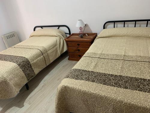 Cama o camas de una habitación en Casa Cuesta de Triana