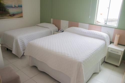Katil atau katil-katil dalam bilik di Hotel Novoleste