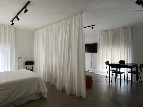 Katil atau katil-katil dalam bilik di Mini loft