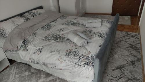 Postel nebo postele na pokoji v ubytování Apartman NINASTA