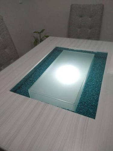 a glass box sitting on top of a table at Acapulco Dreamer Diamante II in Gallinero