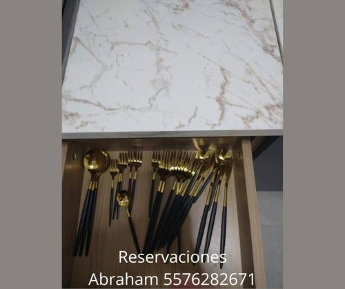 a group of forks and spoons in a drawer at Acapulco Dreamer Diamante II in Gallinero