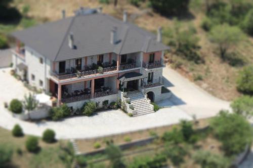 an aerial view of a large house with a porch at Agnanti Zitsas Hotel in Zítsa