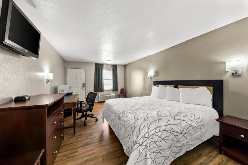 Postel nebo postele na pokoji v ubytování Americas Best Value Inn Bonham