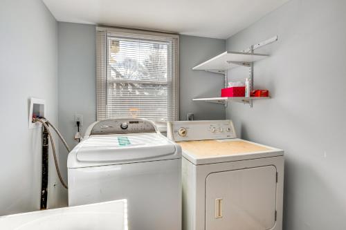 a laundry room with a washing machine and a window at Apartment Rental 2 Mi to Rockland Lake State Park in Valley Cottage
