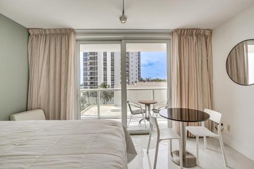 A bed or beds in a room at Ocean Views and Resort Perks Sunny Isles Beach Unit