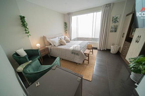 a living room with a bed and a couch at Beautiful Studio in Barranco in Lima