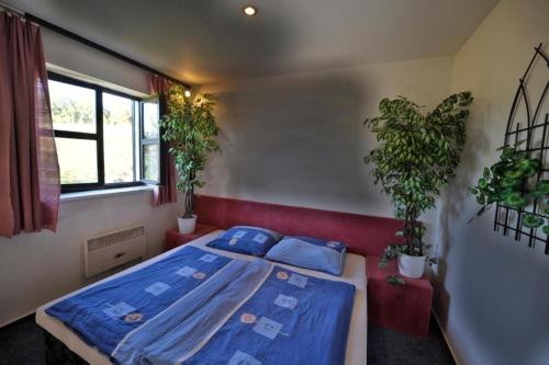 Postel nebo postele na pokoji v ubytování Relax Party Hotel