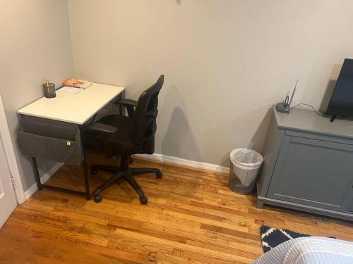 an office with a desk and a chair in a room at The Legato Suite in Brooklyn