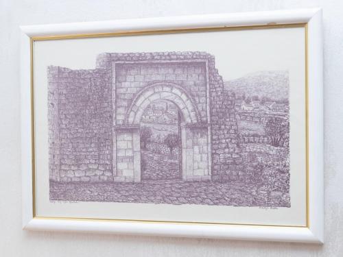 a drawing of a gate in a stone wall at Apartment Kosta in Podgorica