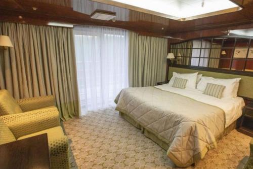 Cama ou camas em um quarto em Captain Cook Cruises Fiji