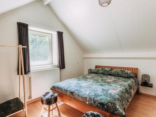 מיטה או מיטות בחדר ב-Noordikhoeve
