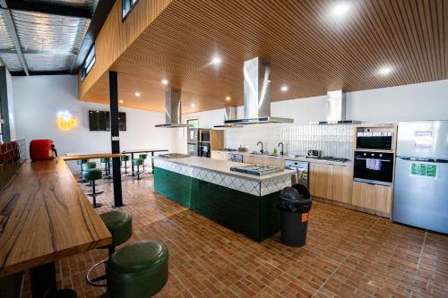 a large kitchen with a counter and a table at BIG4 Yarra Valley Park Lane Holiday Park in Healesville