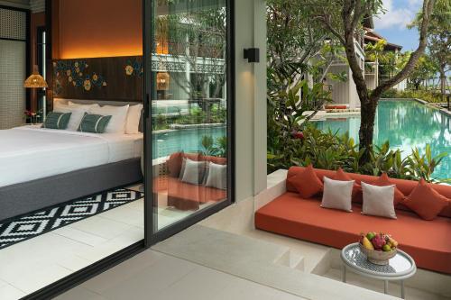 Bazén v ubytování Grand Mercure Khao Lak Bangsak nebo v jeho okolí
