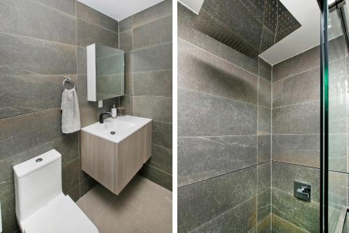 y baño con aseo, lavabo y ducha. en 1597-2 Luxury Upper East Side Studio W&D, en Nueva York