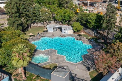 an overhead view of a large swimming pool at Downtown LA - Mamba Suite - Free Indoor Parking! in Los Angeles