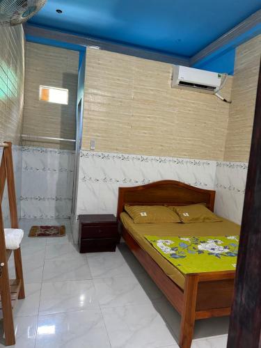 Łóżko lub łóżka w pokoju w obiekcie San Vuon Guesthouse