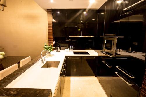 A kitchen or kitchenette at SLD-Yicen INTERNATIONAL SERVICE APARTMENT