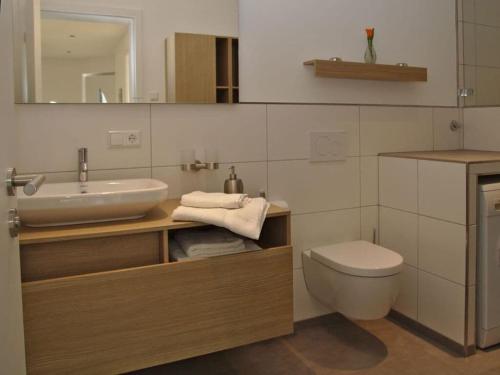 Bilik mandi di Rebenrain Comfortable holiday residence