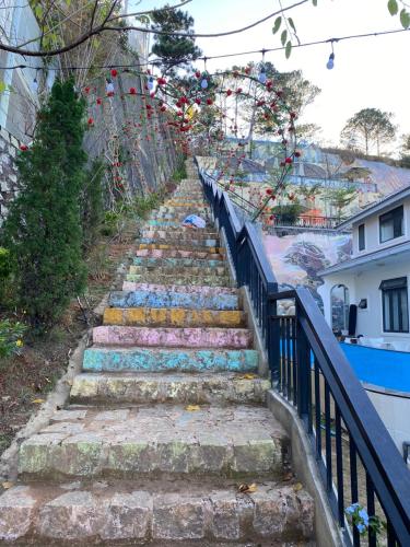 a set of stairs with colorful towels on them at Ánh Tiên Hotel Da Lat in Da Lat