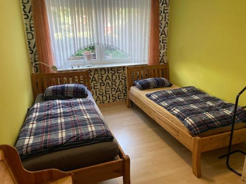 Cama o camas de una habitación en Ferienwohnung Edith