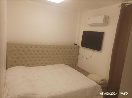 Кровать или кровати в номере Aconchegante com Piscina