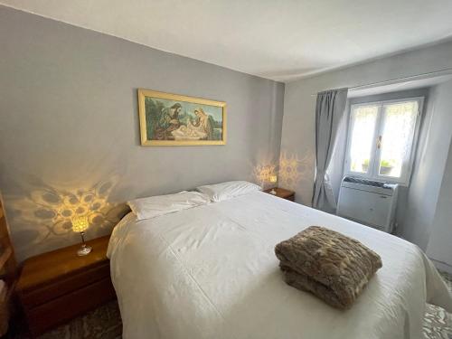 Una cama o camas en una habitación de Cà di Lucca