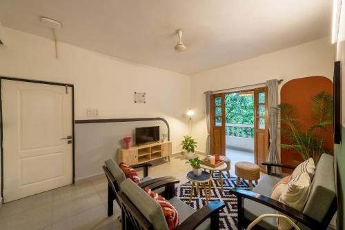 Χώρος καθιστικού στο Olive Hotel Calangute Niwasa by Embassy Group