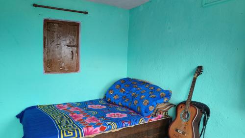 Krevet ili kreveti u jedinici u objektu see kedarnath peak homestay