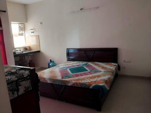 Voodi või voodid majutusasutuse Apartment in Omaxe, Vrindavan toas