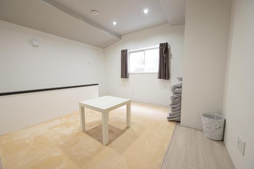 匠の家 大阪城近くの高級感あふれる吹き抜けの家 A Luxurious Home with a Grand Atrium Near Osaka Castle
