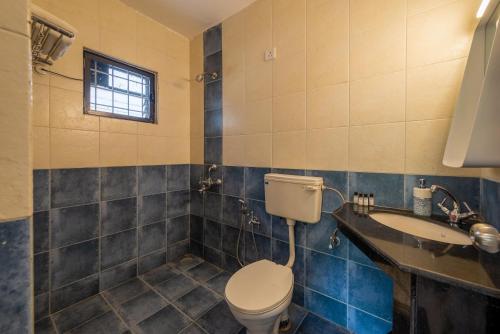 Ένα μπάνιο στο Olive Hotel Calangute Niwasa by Embassy Group