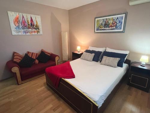 En eller flere senge i et værelse på Valmare