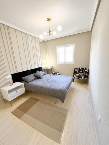 Ένα ή περισσότερα κρεβάτια σε δωμάτιο στο Casa Anna Patio