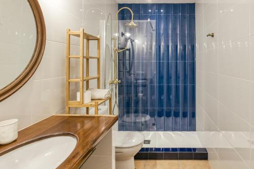 a bathroom with a sink and a shower at Calella Pallafrugell in Palafrugell