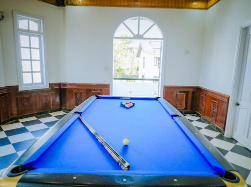 a large blue pool table in a room at Villa Hằng Nga 3 in Ấp Ða Lợi