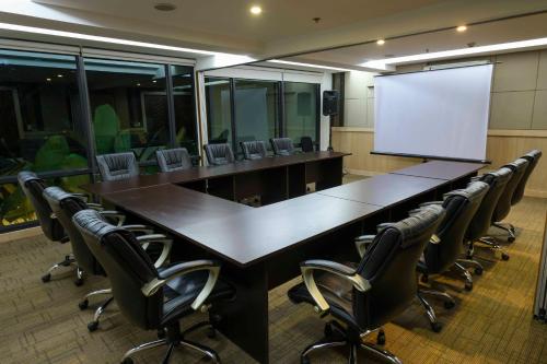 a large conference room with a long table and chairs at Best Western Plus The Ivywall Hotel - Palawan in Puerto Princesa City