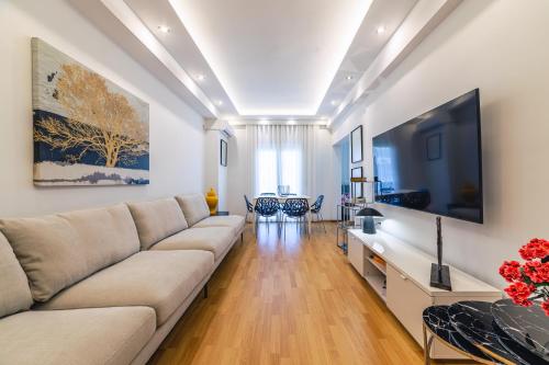 Televízia a/alebo spoločenská miestnosť v ubytovaní D9 center of Glyfada
