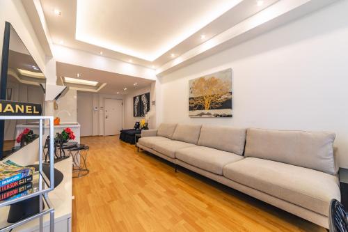 Televízia a/alebo spoločenská miestnosť v ubytovaní D9 center of Glyfada