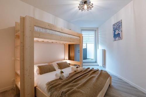 Postel nebo postele na pokoji v ubytování Huswell - Bright apartment only 5 minutes from the beach