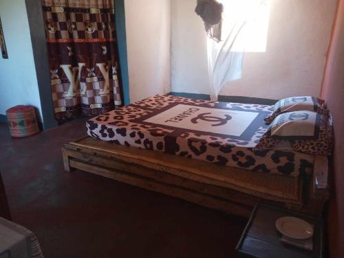 Ένα ή περισσότερα κρεβάτια σε δωμάτιο στο Ecolodge d'Isalo