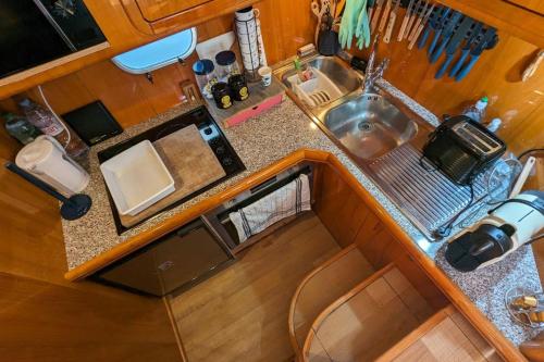 an overhead view of a kitchen with a sink at Le Sky Sailor, idéal Lions in Cannes