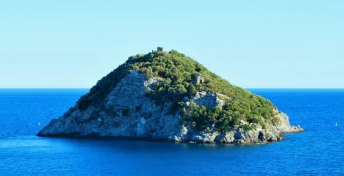 a small island in the middle of the ocean at Albatros in Savona